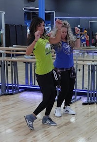 two women dancing in a dance studio